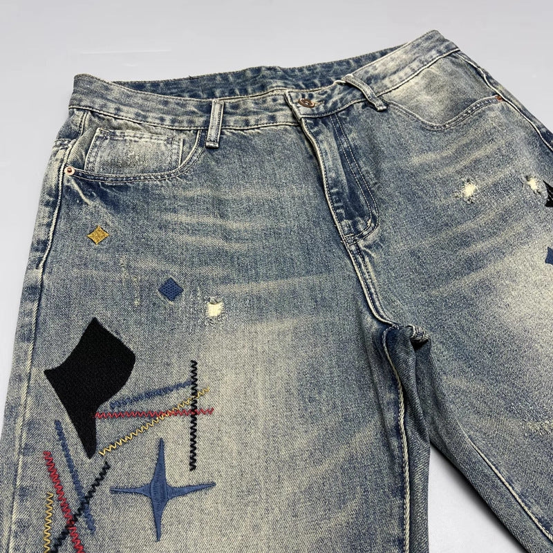 Washed Scraping Denim Patch Embroidered Printed Jeans